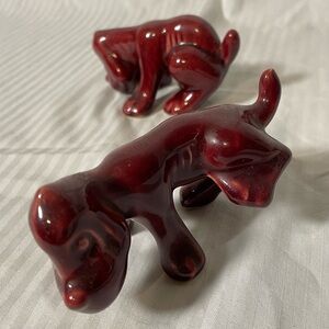 Mid century, burgundy, naughty Dog Camark pottery Figurines